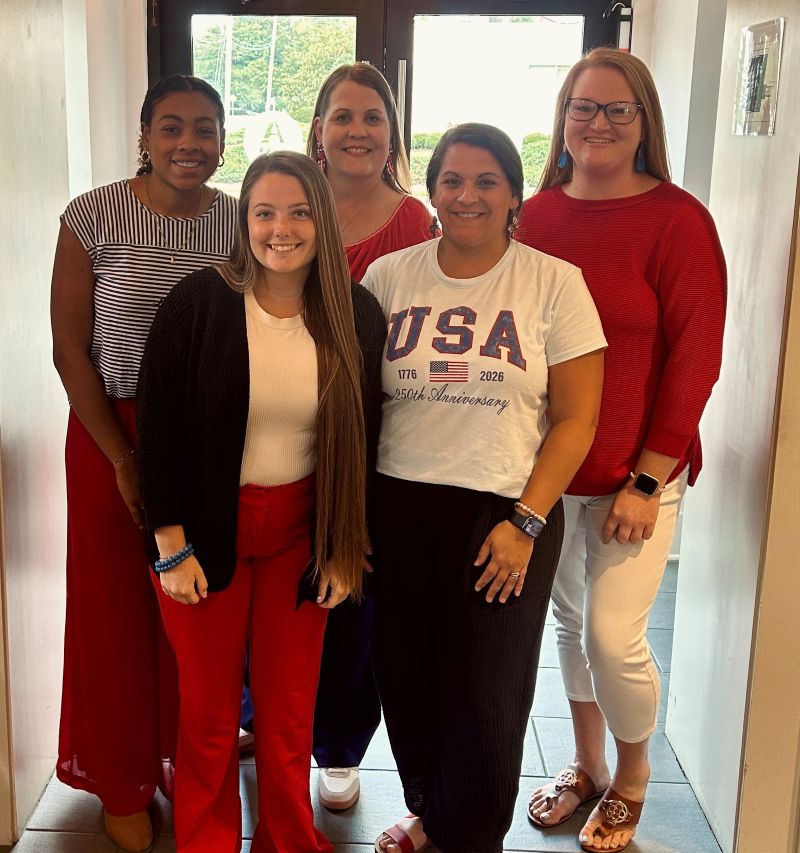 Conway Main St employees dressed in red, white, and blue to celebrate America's 250th birthday