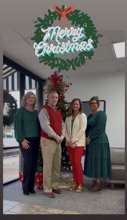 Latta employees in Christmas attire