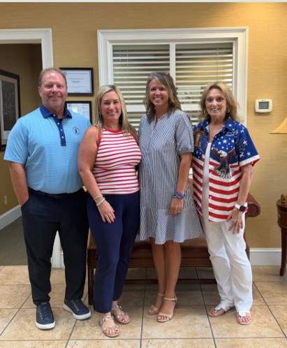 Florence Cashua employees dressed in red, white, and blue to celebrate America's 250th