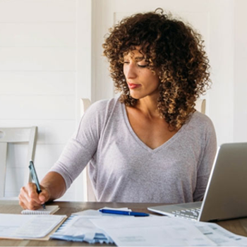 A woman doing finances at home