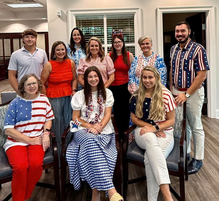 Conway Church Street employees dressed in red, white, and blue to celebrate America's 250th birthday