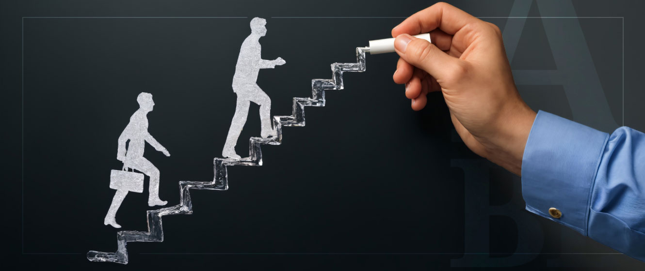 Chalkboard drawing of two people climbing stairs